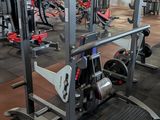 a large gym with a lot of machines in it