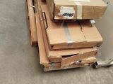 a stack of boxes sitting on top of each other on the floor