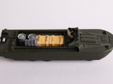 a toy boat with batteries in it on a white surface