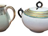 two different types of teapots on a white background