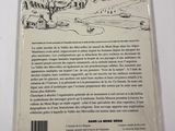 the back cover of a book with a drawing of a mountain scene