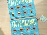 two bags that have different types of coffee on them