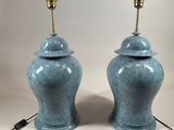 pair of blue glazed urns with brass bases