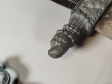 a close up of a metal object on a table