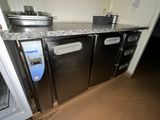 a small kitchen with a stove and a dishwasher