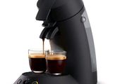 an image of a coffee maker with two cups of coffee