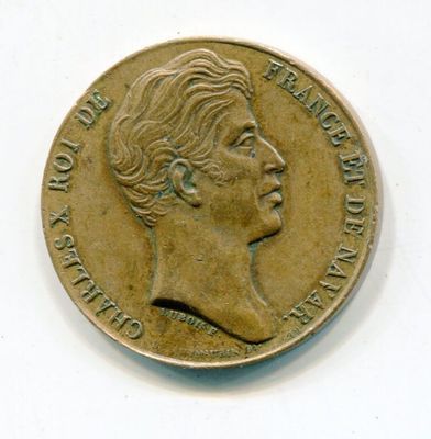 a gold coin with a portrait of a woman on it