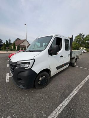a picture of a white van parked in a parking lot