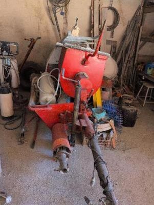 an image of a garage filled with tools and a fire hydrant