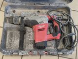a tool in a case that is on the floor