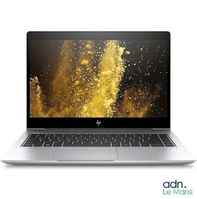 an open laptop computer sitting on top of a white surface