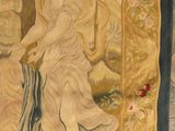 an image of a tapestry hanging on a wall in a room