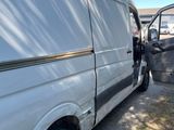a white van that is parked in a lot