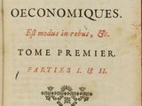 un vieux livre dont le titre est écrit en noir et rouge