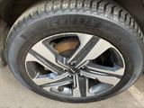 a close up of a tire on a car