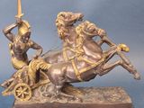 statue représentant un homme à cheval, muni d'une épée, et une femme à cheval