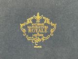 an image of a black book with a gold logo on it