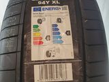 a close up of a tire with a sticker on it