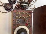 a wooden box with headphones on top of it