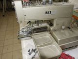 a sewing machine that is sitting on a table