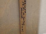 a picture of a piece of wood with writing on it