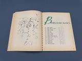 an open book with a drawing of a man riding a bike