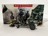 figurines of a toy army vehicle with soldiers and a flag