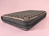 an image of a wallet with a zipper on a pink background