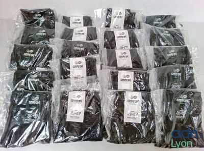 many bags of chocolate sitting on a table