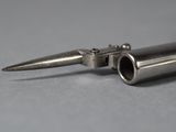 a small metal object that is on a table