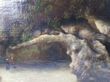 a painting of a man and a child in a cave
