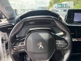 the interior of a car with a steering wheel and dashboard