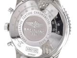 the breitling watch is made of stainless steel and has a silver dial