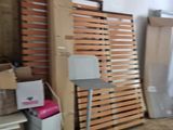 a room with a lot of boxes and boxes on the floor