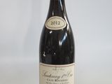 a bottle of wine that is sitting on a table