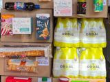 boxes of food and drinks are stacked on top of each other