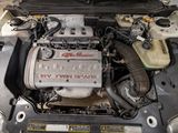 a picture of a car engine with its hood open