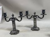 three candles that are sitting on a table