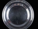 an image of a clear glass plate on a black background