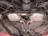 a picture of a car that is under a vehicle