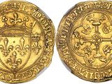 a gold coin with a shield on the front and a shield on the back