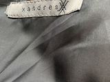 a close up of the label on a jacket