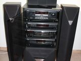 a lot of speakers that are stacked on top of each other