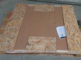 a picture of a cardboard box on a pallet on the ground