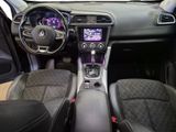 the interior of a car with a steering wheel, dashboard, and dash board