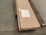 a box that is sitting on the floor next to a wall