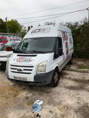 a white van that is parked in a lot