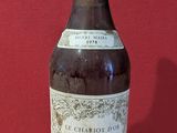 a bottle of wine that is sitting on a table