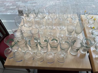 many glasses on the table with a lot of them