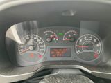 a close up of a car dashboard with a speedometer and gauges